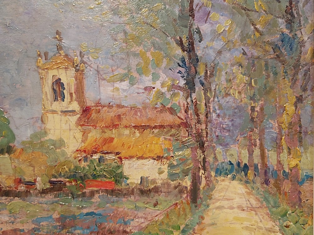 A framed impressionist landscape oil painting depicting a rural church, surrounding village buildings, lavender fields, and a dirt path. View XVI