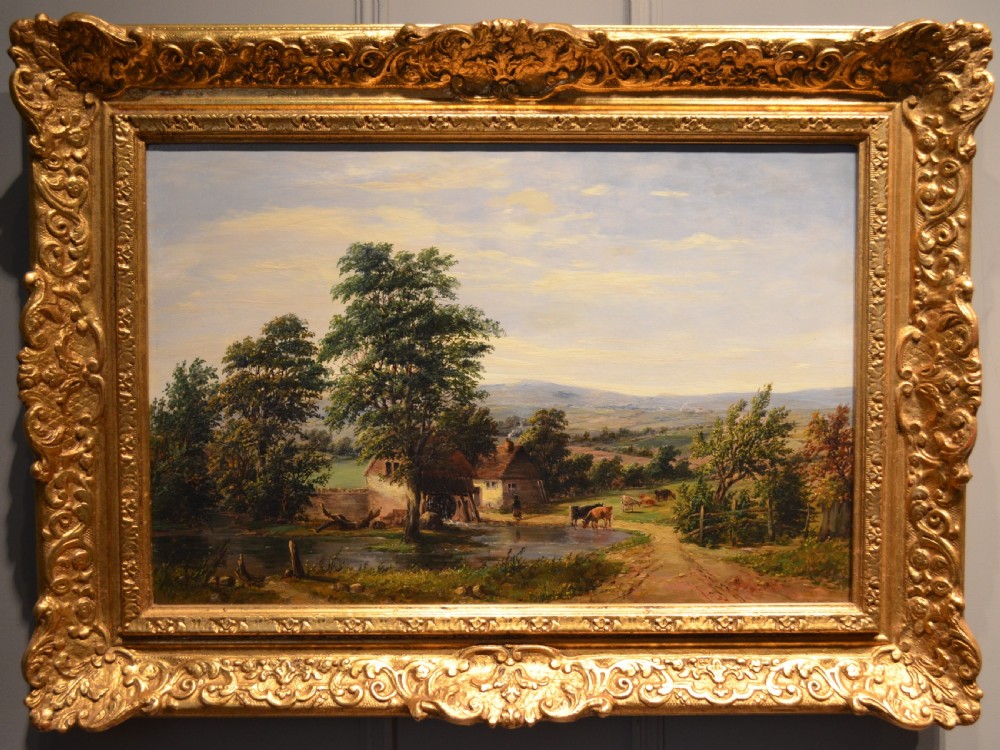 A pair of 19th-century oil paintings on canvas depicting peaceful English rural landscapes framed in elaborate gold giltwood frames. View XII