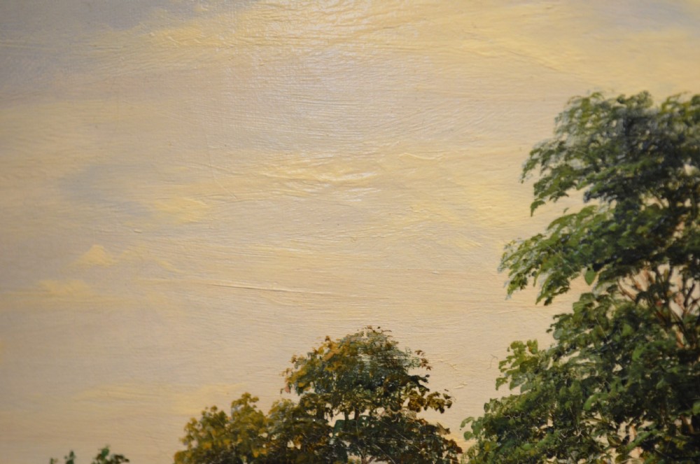 A pair of 19th-century oil paintings on canvas depicting peaceful English rural landscapes framed in elaborate gold giltwood frames. View XXII