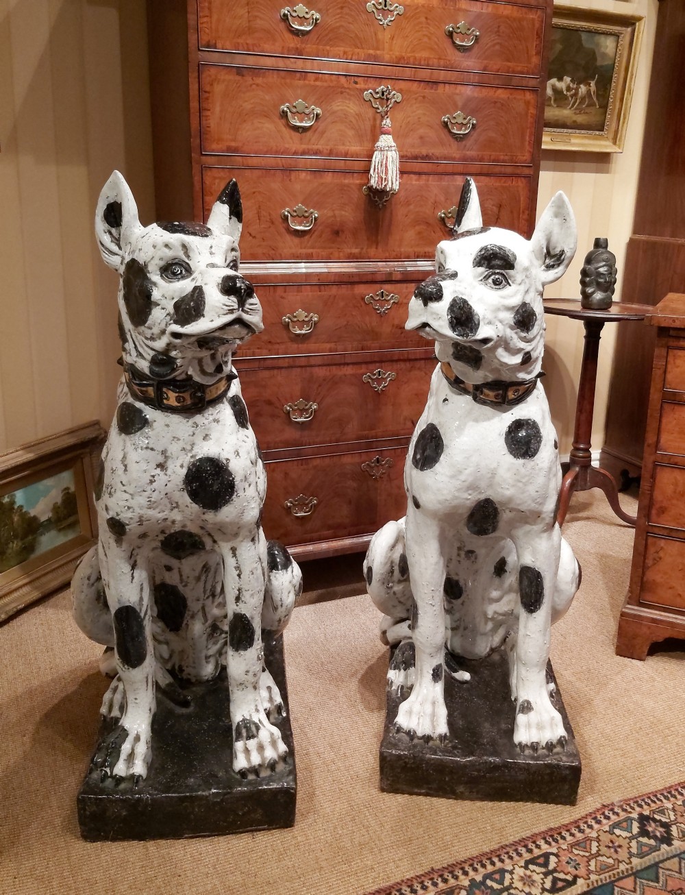A Pair of Lifesize Pottery Glazed Dogs.