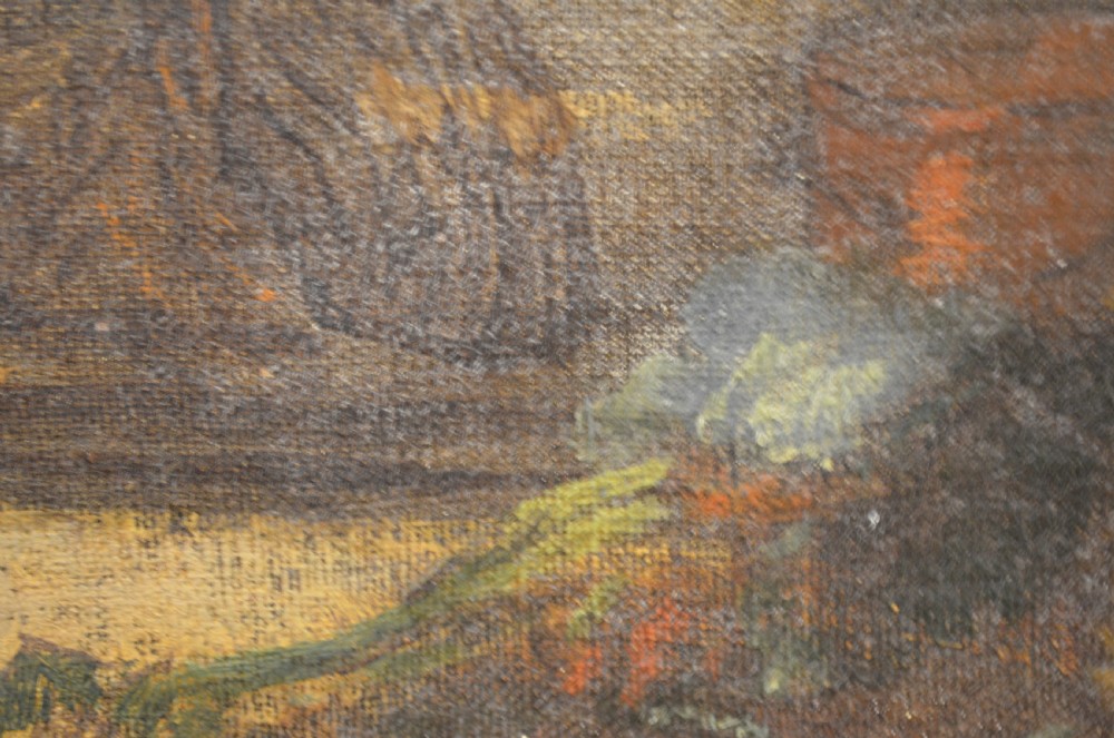 A 19th-century framed oil painting depicting a rustic interior scene with a figure near a table amidst hanging items. View XVII