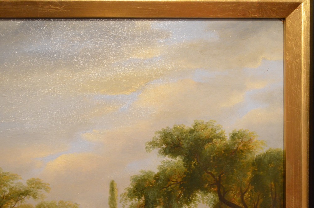An antique framed Dutch pastoral oil painting depicting cattle, sheep, goats, a donkey, and figures in an open landscape under a cloud-filled sky. View X