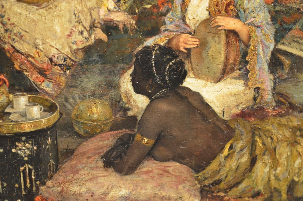 A framed 19th-century Orientalist oil painting on board featuring figures playing music and resting in a detailed interior scene. View XI