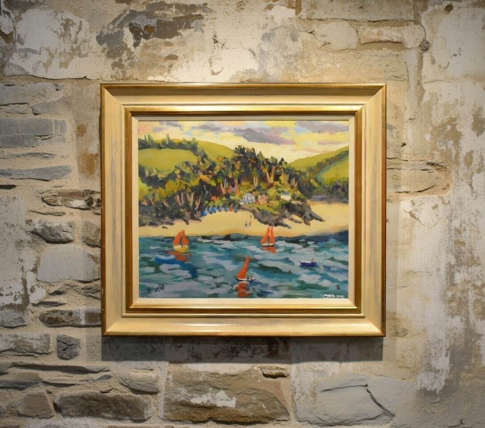 A framed oil painting on canvas depicting boats with red sails on blue water before a sandy shore and green hills.