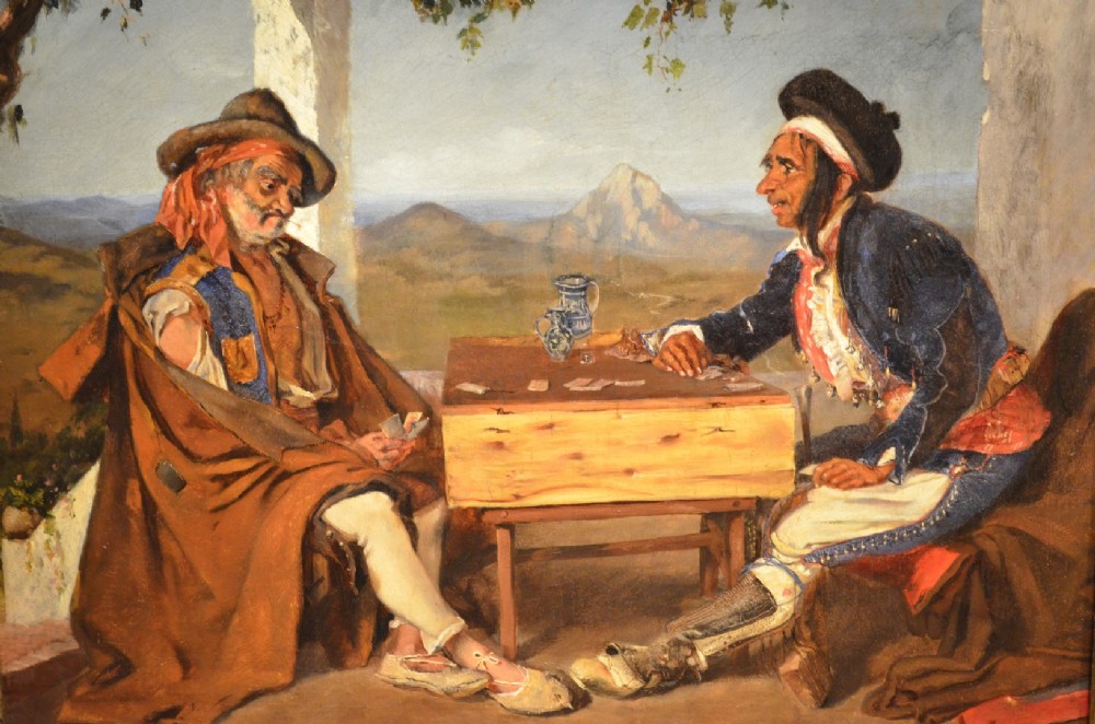 A framed 19th-century oil painting on canvas depicting two men in traditional Spanish attire playing cards at a wooden table beneath a vine-covered trellis. View II