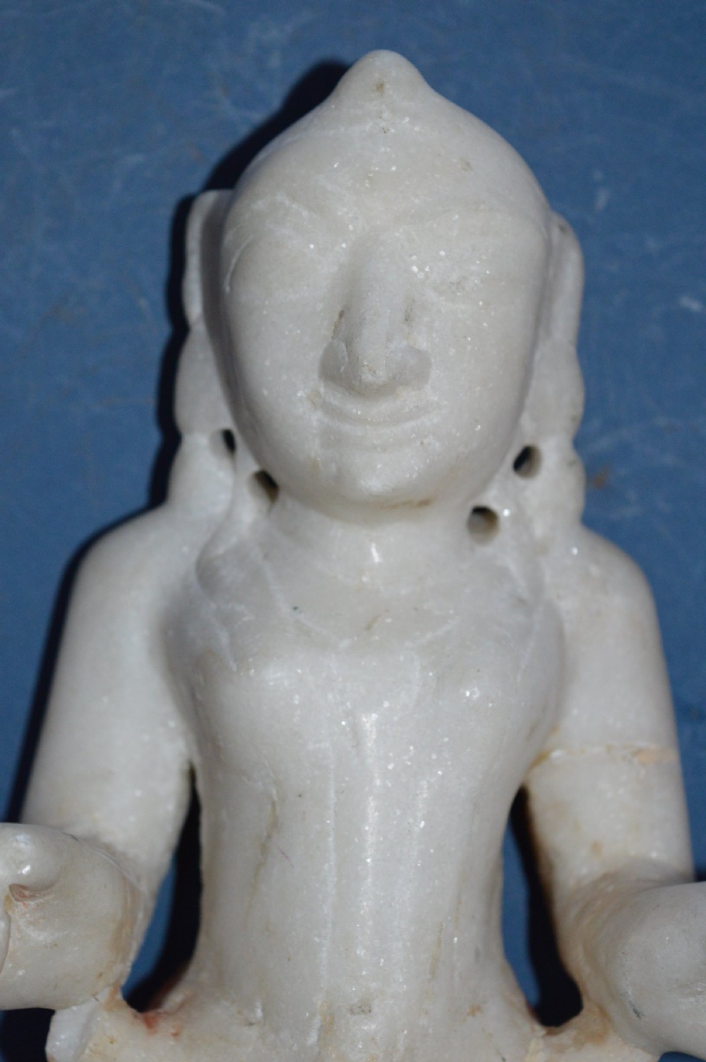 A carved white alabaster standing religious statue with hand-carved drapery details and a smooth finish. View IV