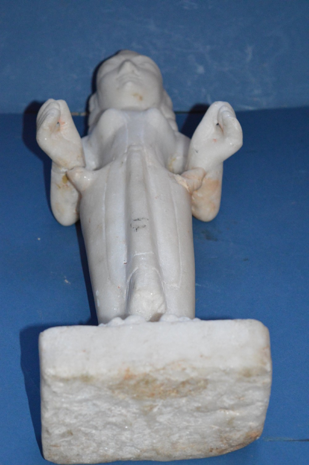 A carved white alabaster standing religious statue with hand-carved drapery details and a smooth finish. View VIII