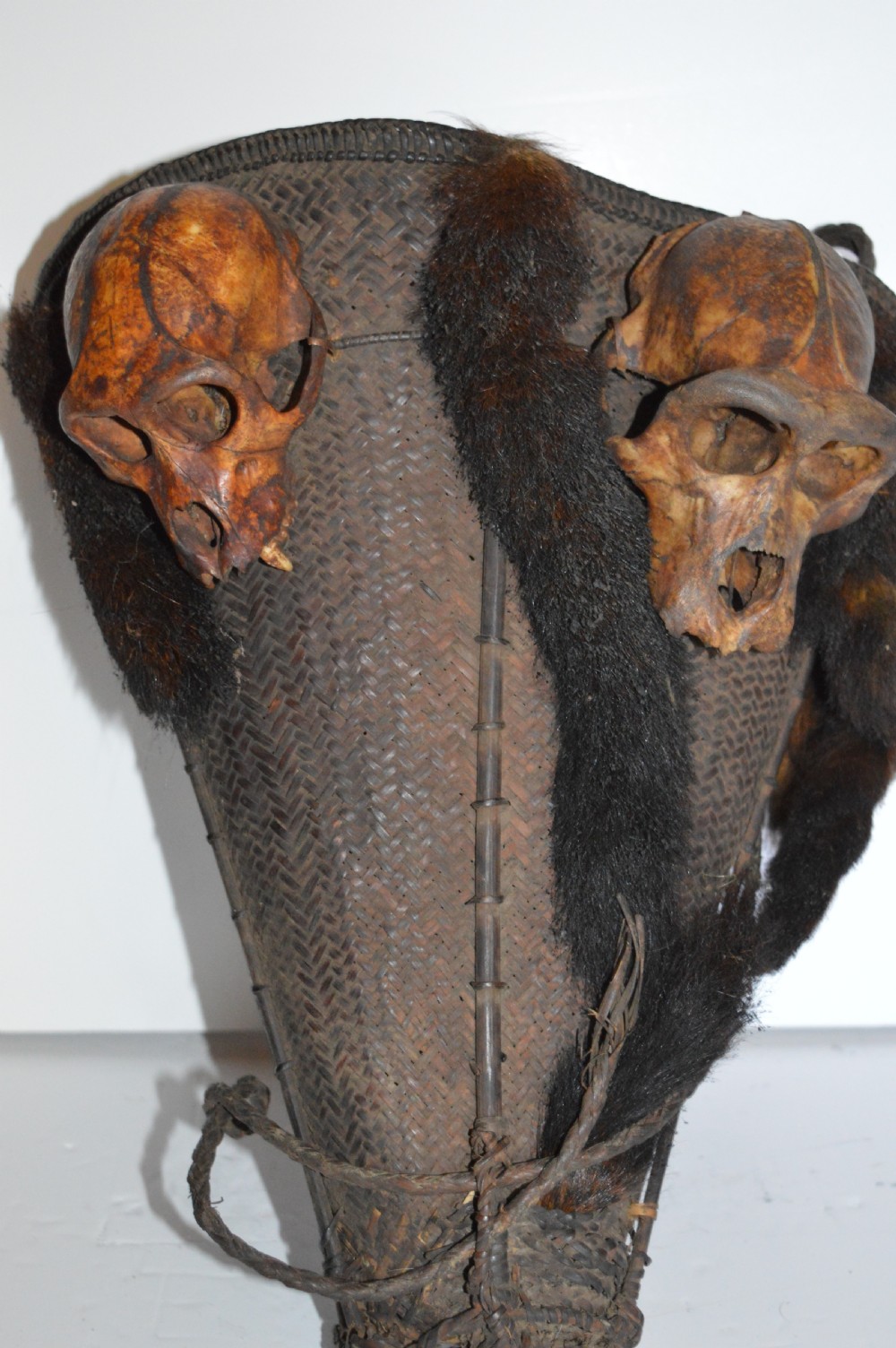 Dayak Headhunters Basket, c 1920,Monkey Head and Tail Decoration
