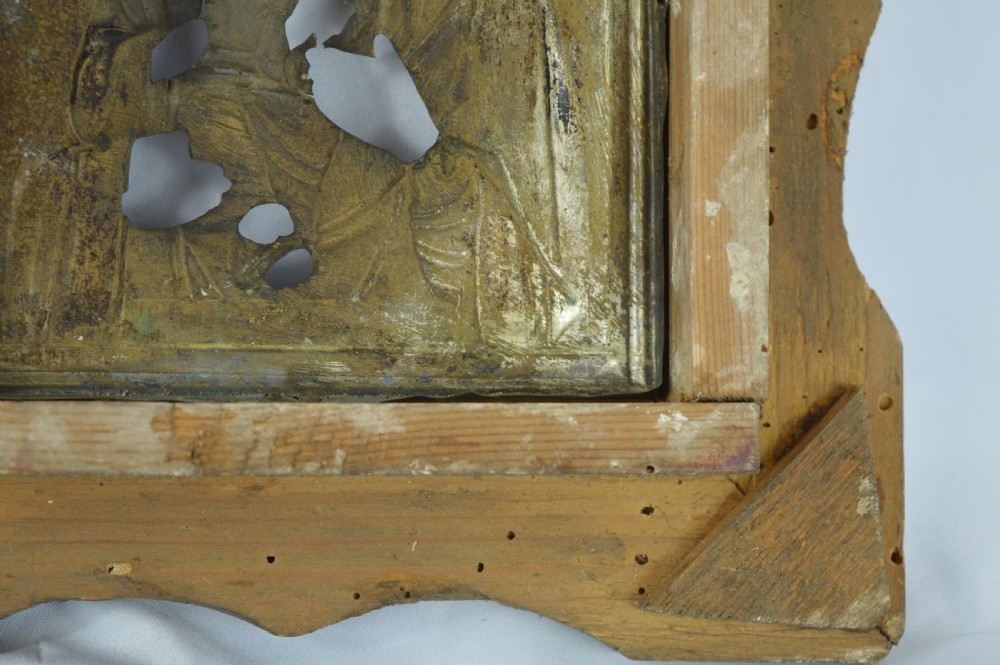 An early 20th-century Russian Orthodox icon depicting the Virgin Mary and Christ Child inside a carved, gilded wooden frame. View VIII