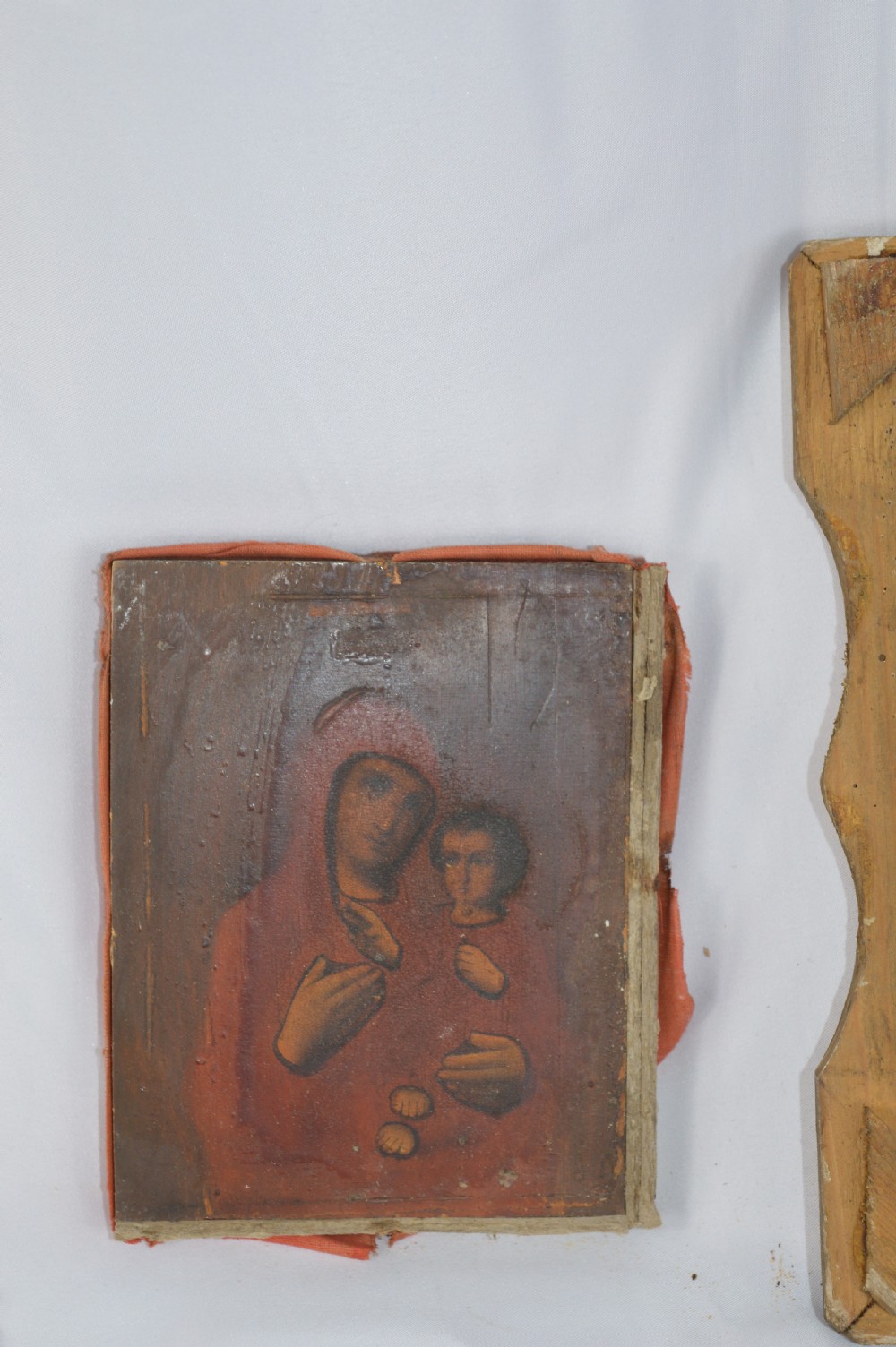 An early 20th-century Russian Orthodox icon depicting the Virgin Mary and Christ Child inside a carved, gilded wooden frame. View XI