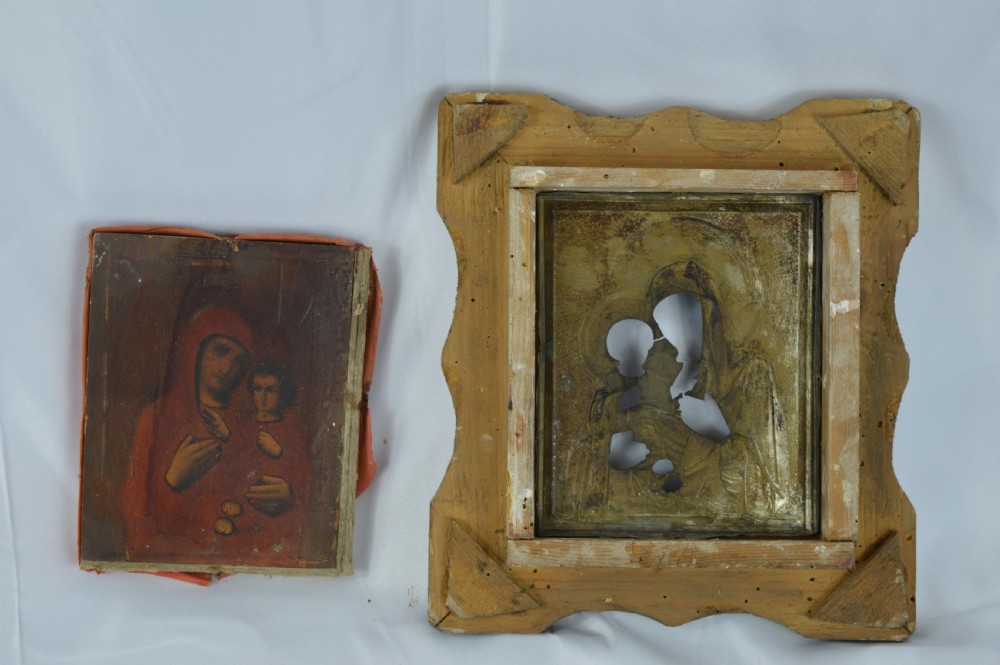 An early 20th-century Russian Orthodox icon depicting the Virgin Mary and Christ Child inside a carved, gilded wooden frame. View XII