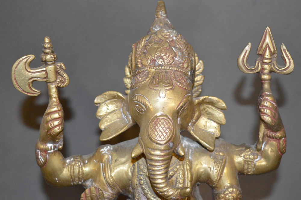 A late 19th-century cast bronze standing Lord Ganesha statue mounted on a lotus pedestal with a small rodent figure at the base. View V