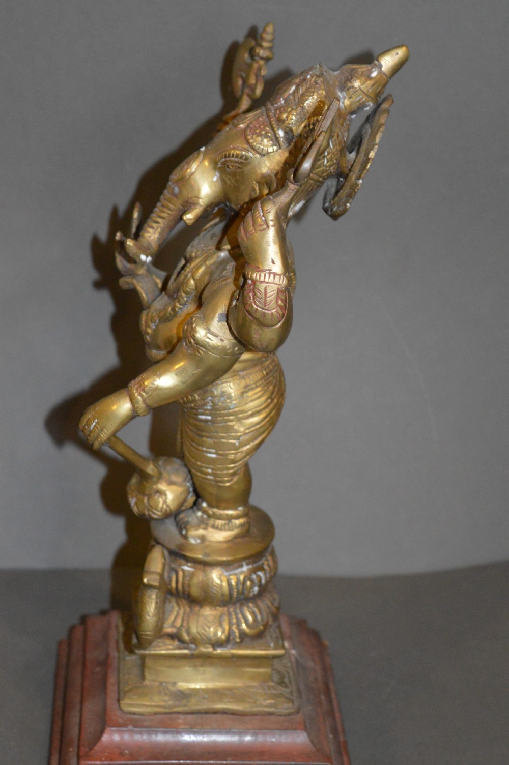 A late 19th-century cast bronze standing Lord Ganesha statue mounted on a lotus pedestal with a small rodent figure at the base. View IX