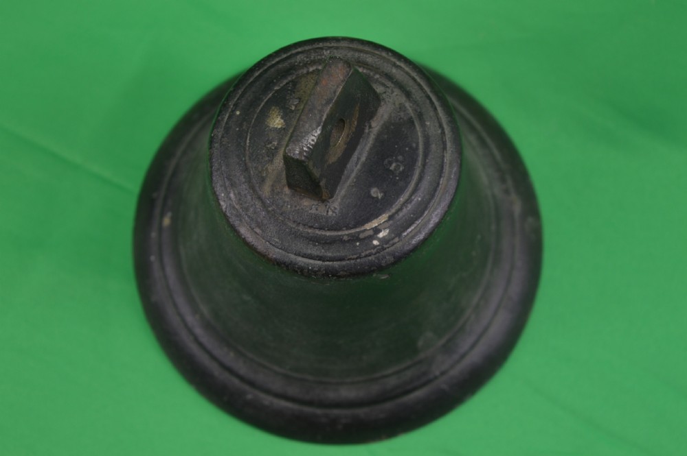 A nineteenth-century cast bronze ships bell featuring a dark aged patina, subtle molded body ring detailing, and an upper mounting lug. View VII