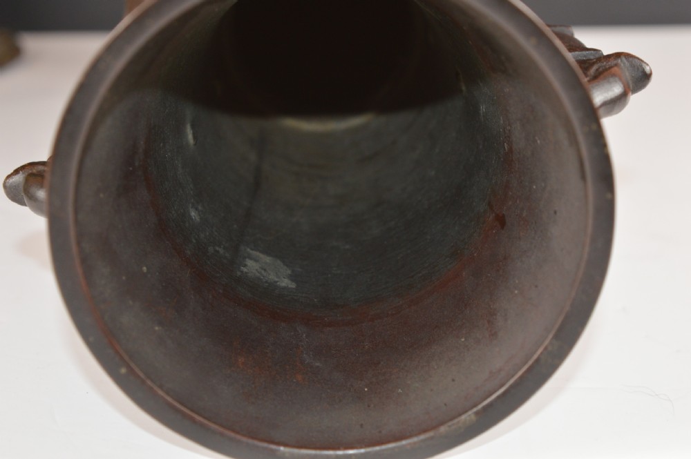 A cast dark bronze baluster vase featuring dragon-form side handles, a flared rim, and relief carvings of birds perched on flowering branches. View XI