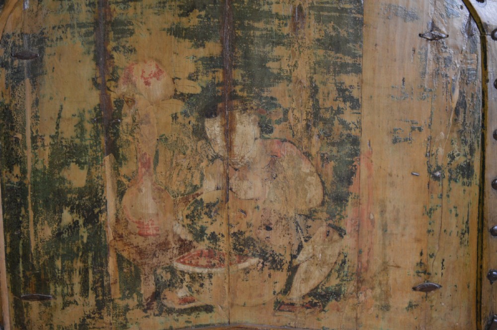 An arched antique Chinese wooden cart door featuring faded hand-painted figures, weathered green pigments, and iron studs. View IV