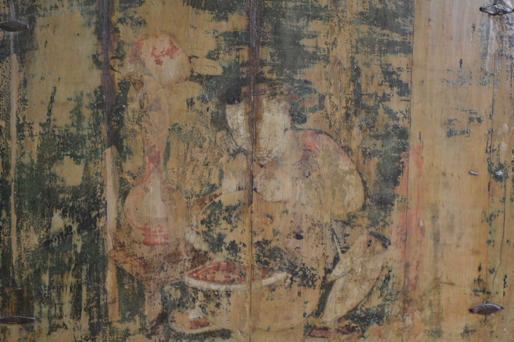An arched antique Chinese wooden cart door featuring faded hand-painted figures, weathered green pigments, and iron studs. View IX