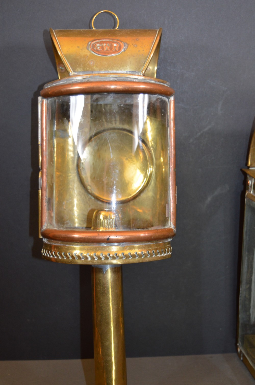 A pair of 19th-century GWR brass and copper railway carriage oil lamps featuring engraved oval GWR plaques. View III