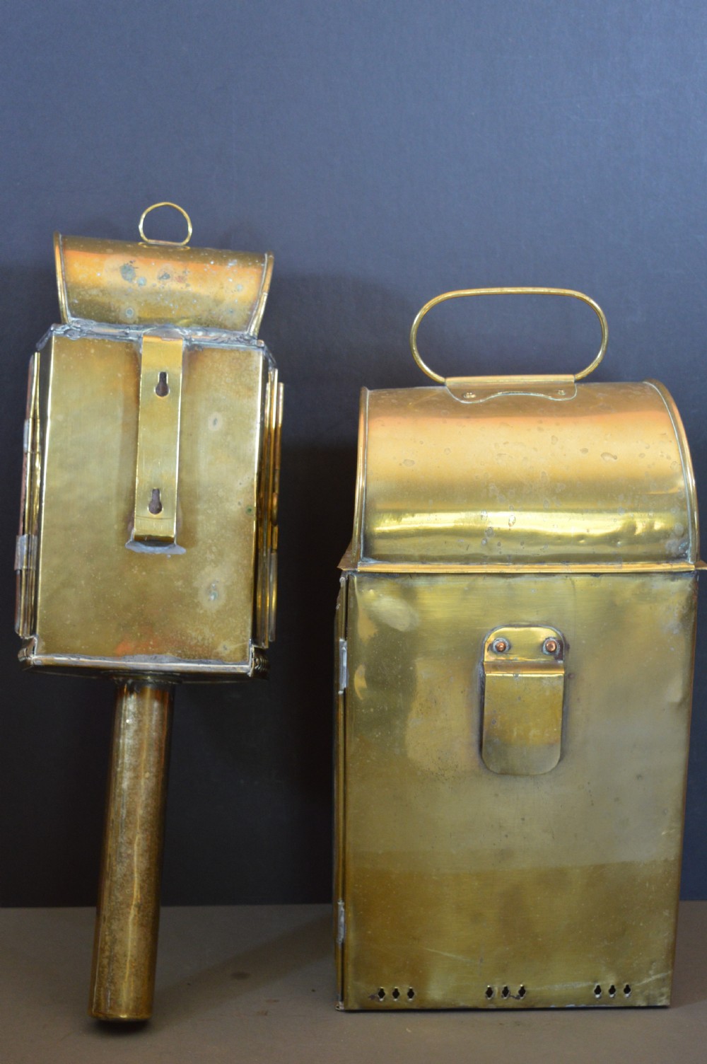 A pair of 19th-century GWR brass and copper railway carriage oil lamps featuring engraved oval GWR plaques. View V