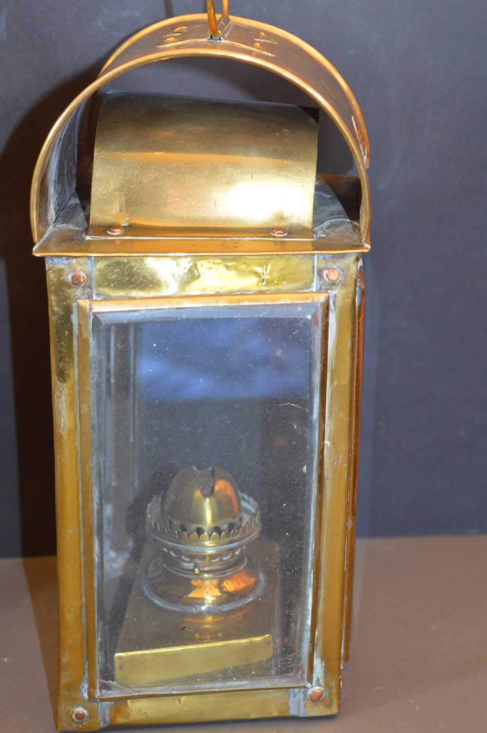 A pair of 19th-century GWR brass and copper railway carriage oil lamps featuring engraved oval GWR plaques. View VII