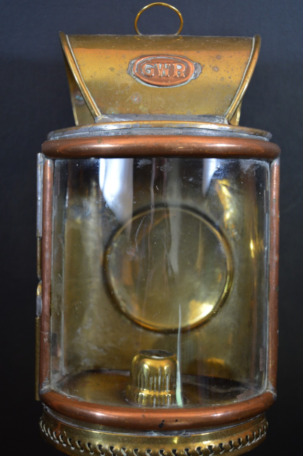 A pair of 19th-century GWR brass and copper railway carriage oil lamps featuring engraved oval GWR plaques. View X