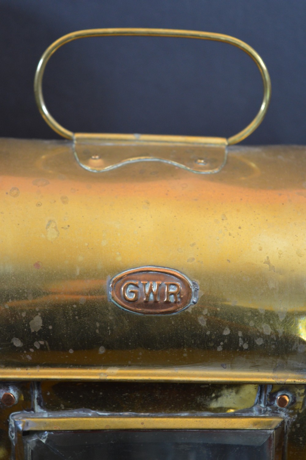 A pair of 19th-century GWR brass and copper railway carriage oil lamps featuring engraved oval GWR plaques. View XI