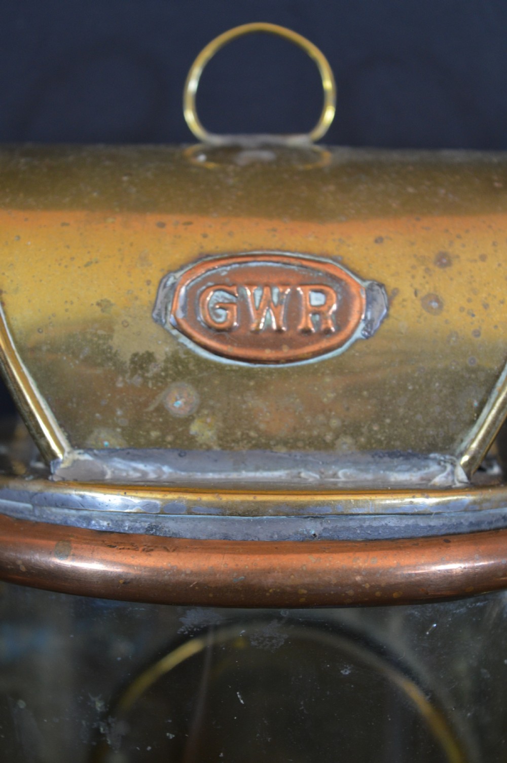 A pair of 19th-century GWR brass and copper railway carriage oil lamps featuring engraved oval GWR plaques. View XII