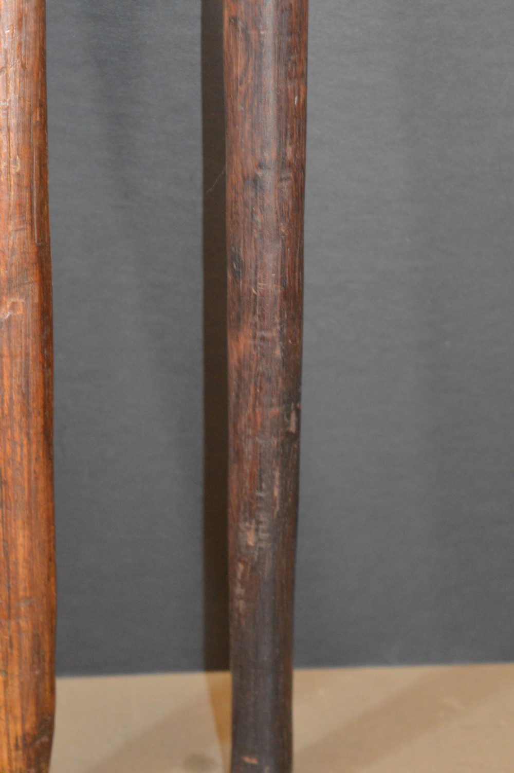Pair of late nineteenth-century hand-carved dark hardwood Oceanic war clubs featuring geometric carved decoration on the heads. View VI