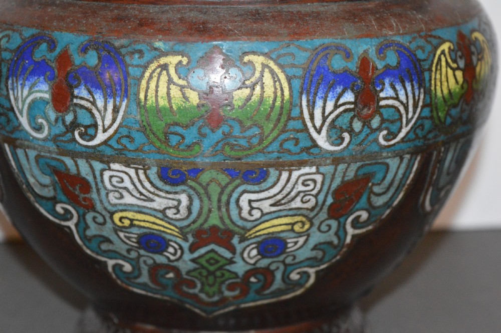 A late 19th-century Chinese bronze vessel decorated with cloisonne enamel bat motifs and geometric patterns in turquoise, blue, red, and yellow. View II