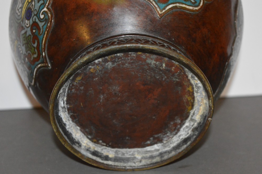 A late 19th-century Chinese bronze vessel decorated with cloisonne enamel bat motifs and geometric patterns in turquoise, blue, red, and yellow. View IV