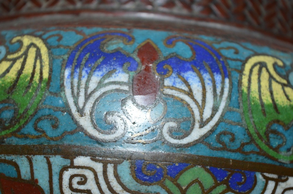 A late 19th-century Chinese bronze vessel decorated with cloisonne enamel bat motifs and geometric patterns in turquoise, blue, red, and yellow. View VI