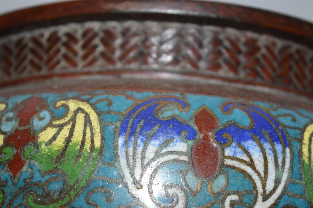 A late 19th-century Chinese bronze vessel decorated with cloisonne enamel bat motifs and geometric patterns in turquoise, blue, red, and yellow. View VII