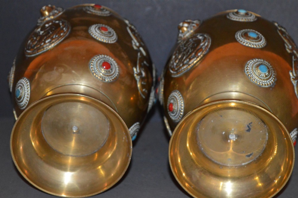 A matching pair of polished brass baluster vases featuring applied serpentine dragon motifs and circular beaded medallions set with turquoise and coral cabochons. View IX