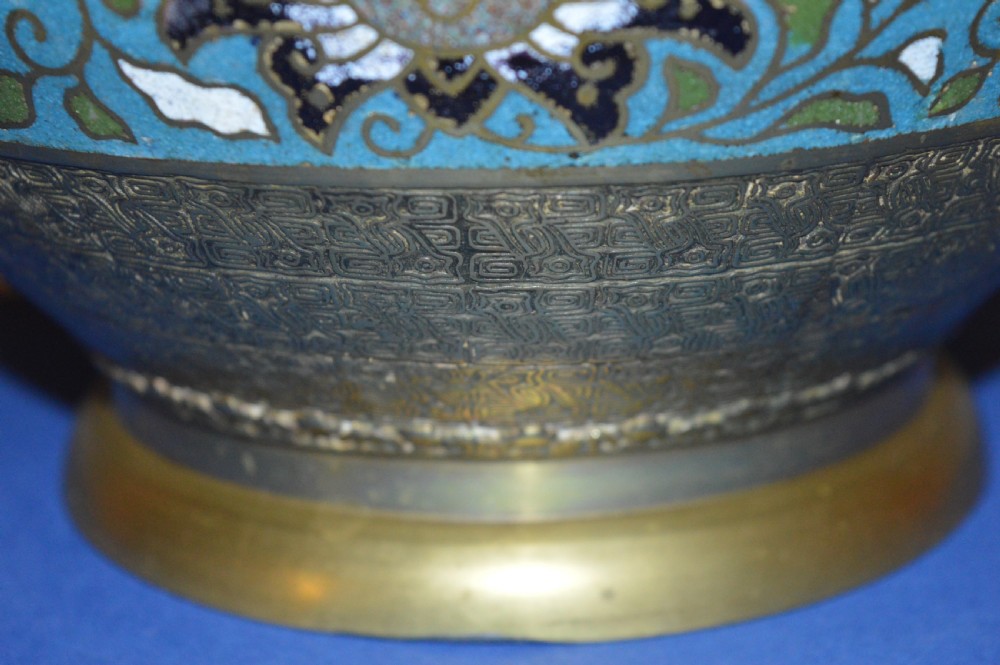 A rounded antique Chinese bronze and cloisonne enamel bowl featuring turquoise ground with floral scroll patterns and a brass rim and base. View IV