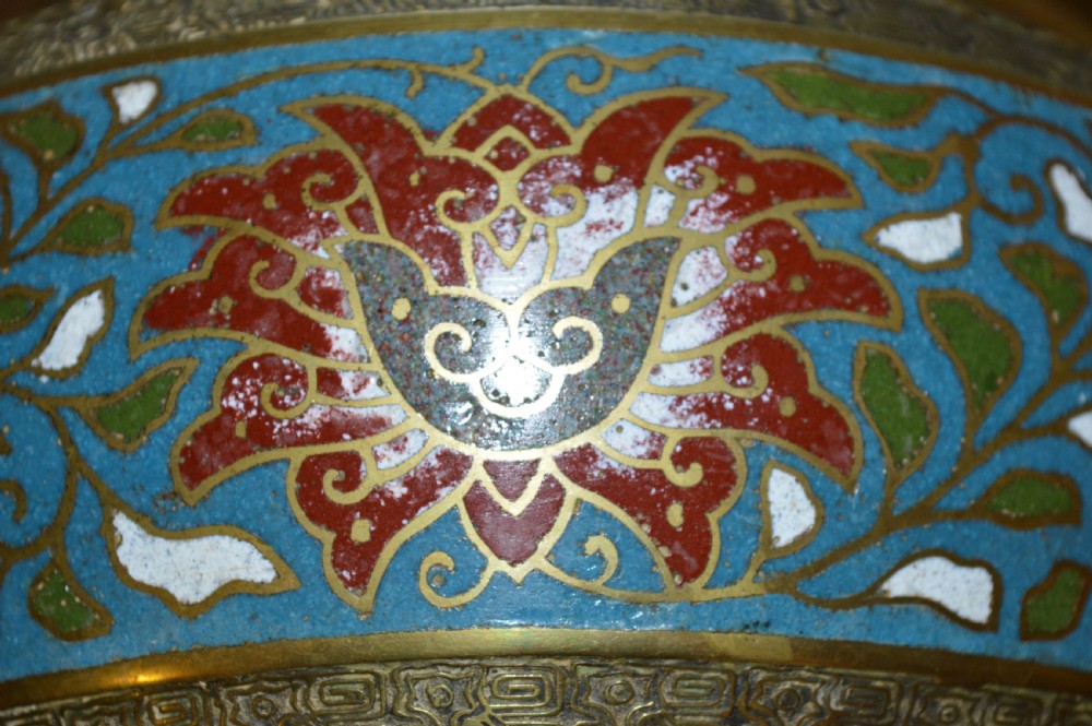A rounded antique Chinese bronze and cloisonne enamel bowl featuring turquoise ground with floral scroll patterns and a brass rim and base. View IX