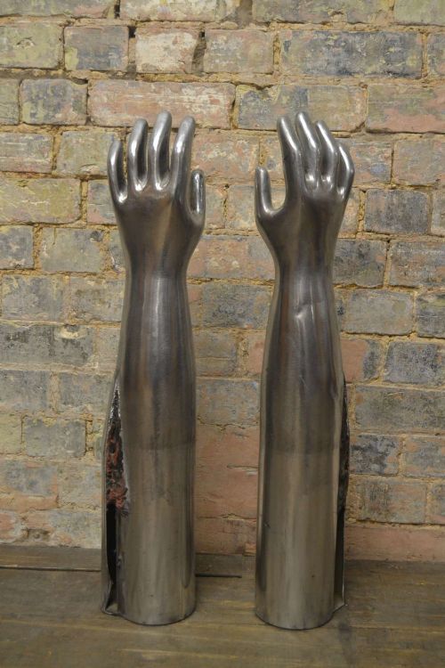 1930s Metal Arms