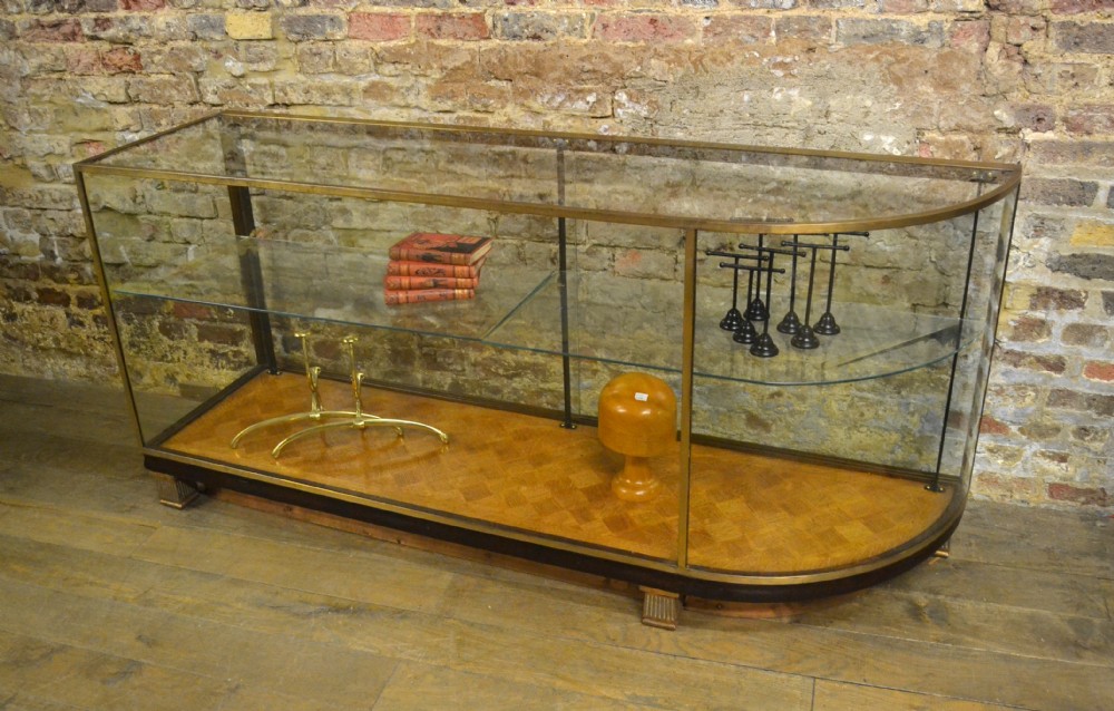 1920s Bronze and Mahogany Single Bow Ended Shop Display Counter