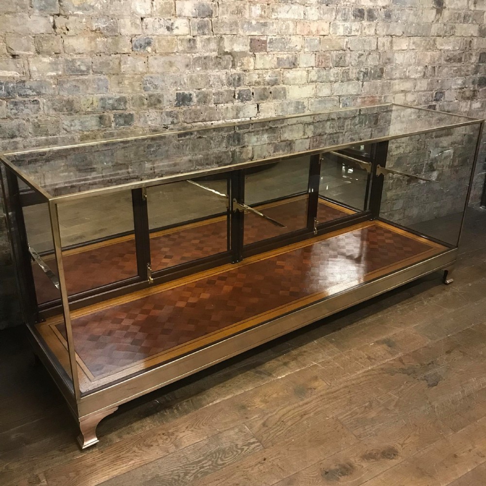Antique brass and mahogany shop counter from Mappin & Webb View II