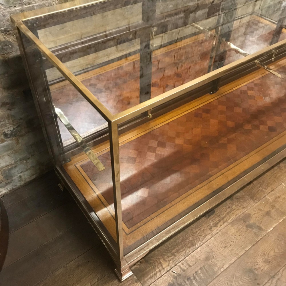 Antique brass and mahogany shop counter from Mappin & Webb View V
