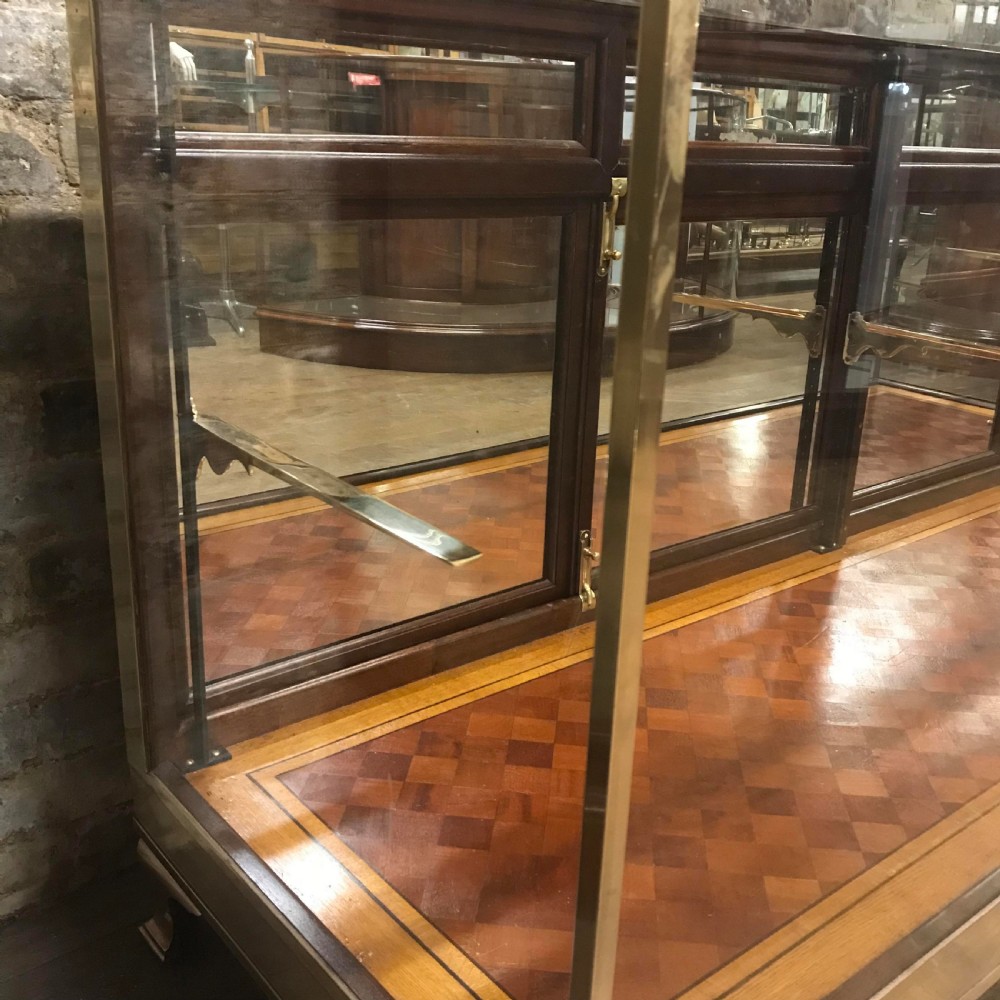 Antique brass and mahogany shop counter from Mappin & Webb View VI