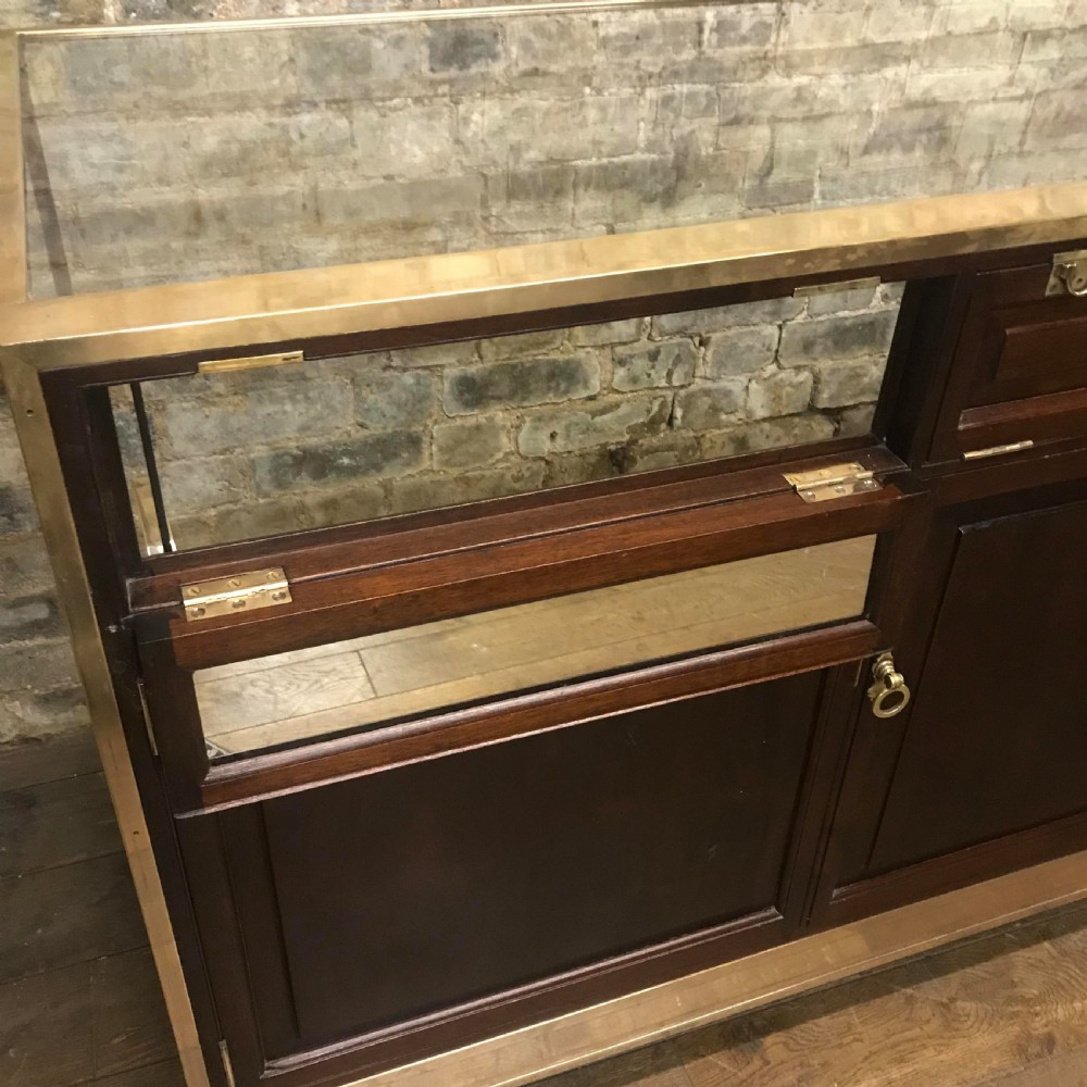 Antique brass and mahogany shop counter from Mappin & Webb View IX