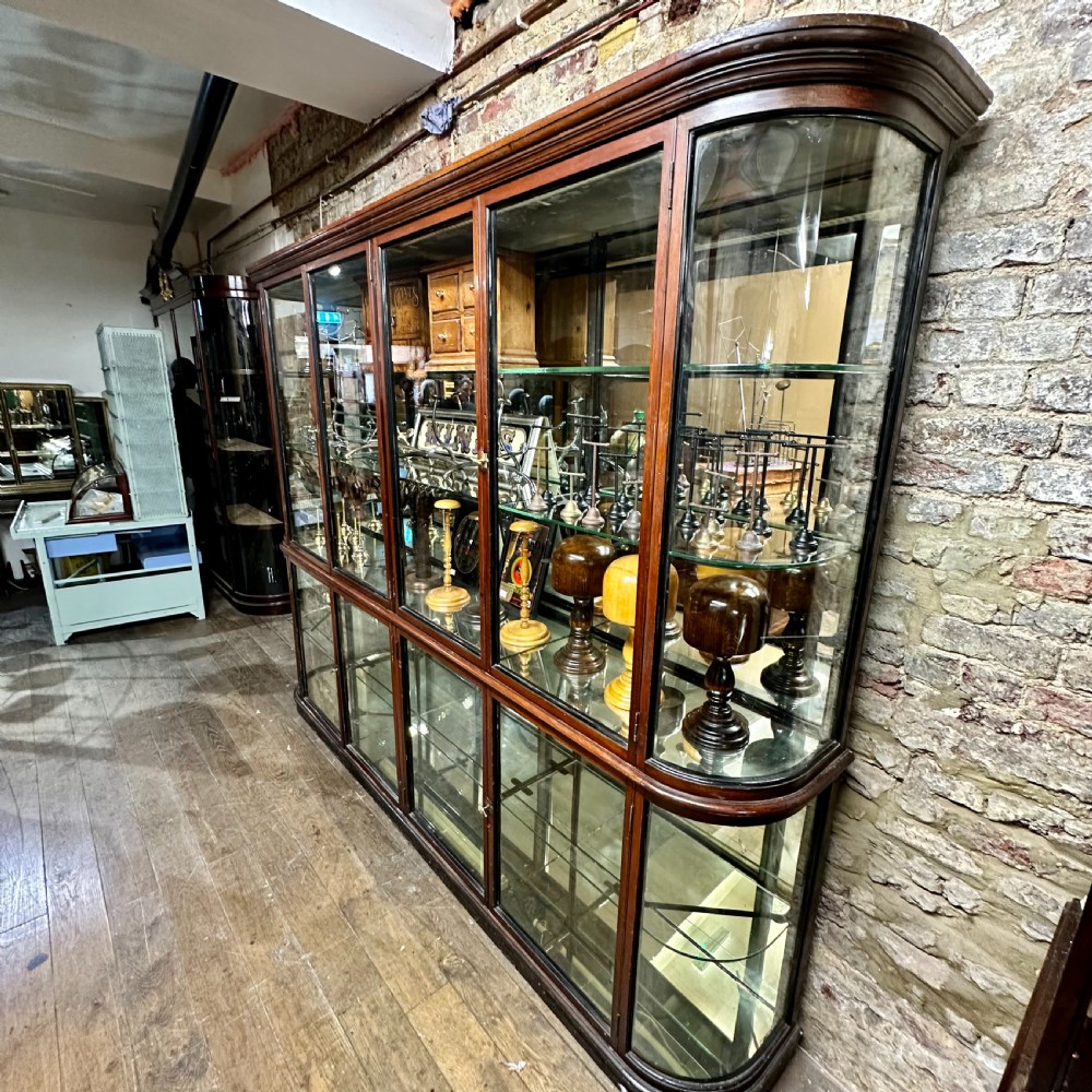 VICTORIAN MAHOGANY BOWED SHOP DISPLAY CABINET View II