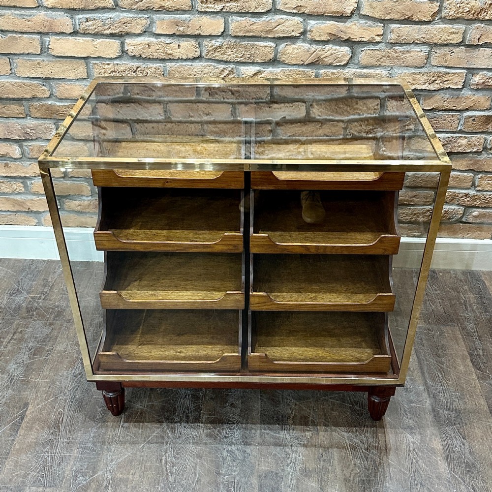 2 ACROSS BRASS FRAMED HABERDASHERY COUNTER (2)
