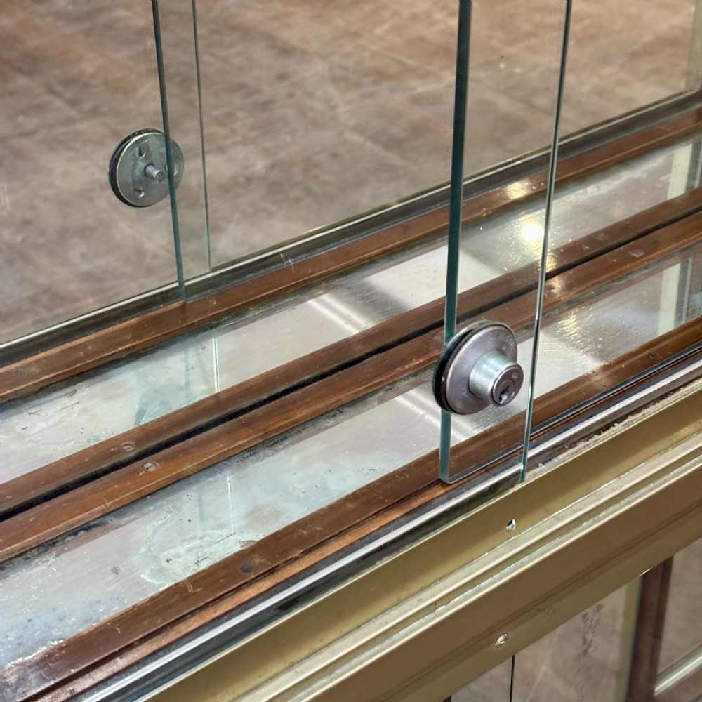 EARLY CENTURY BRASS AND GLASS SHOP DISPLAY CABINET View II