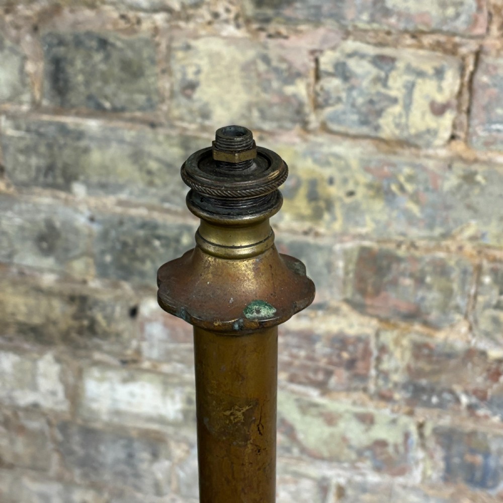 An antique brass floor lamp stand featuring spiral barley twist supports, a central column, and a decorative domed base resting on scrolled feet. View III