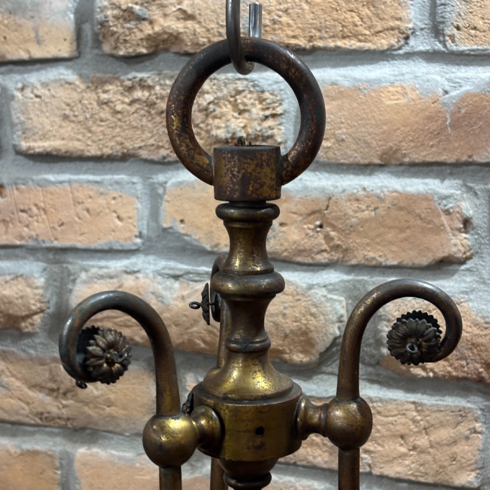 A late Victorian ceiling pendant light featuring a cut glass bowl suspended by three curved bronze rods attached to a central top ring. View III
