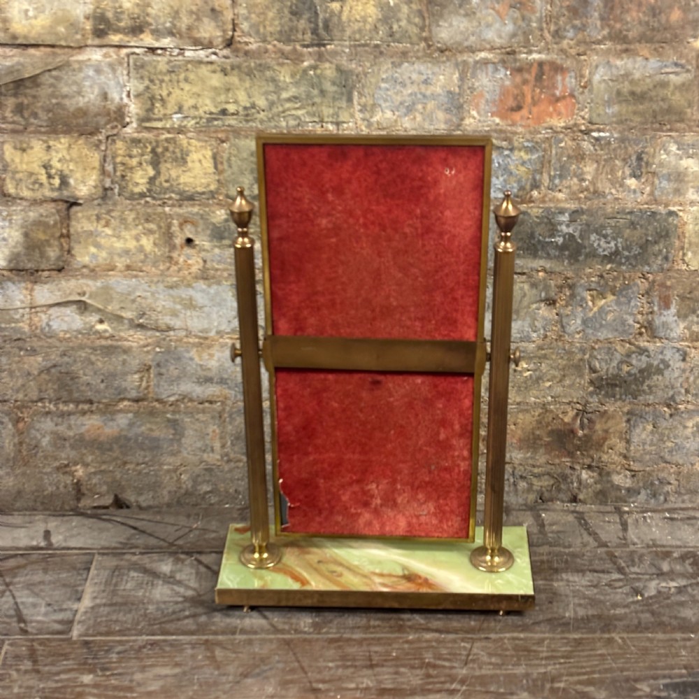 An Art Deco tabletop dressing mirror featuring a rectangular glass panel, fluted brass support columns, and a rectangular green onyx base. View IV