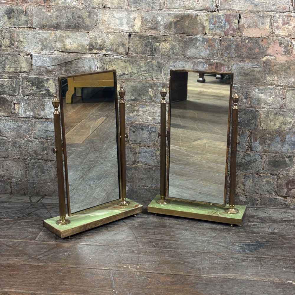 An Art Deco tabletop dressing mirror featuring a rectangular glass panel, fluted brass support columns, and a rectangular green onyx base. View VI