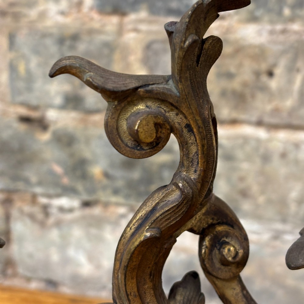 A two-arm gilt brass table lamp base featuring sculpted leaf motifs, curved organic branches, and a broad scrolling base. View IV