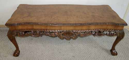 longjohn carved walnut coffee table with slides - CATEGORY: ANTIQUE TABLES - DATED 1930